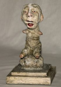 Stroff Denis :'Condition d'artiste' Wood papier-mâché stone Mixed media acryl paint 27 x 15 x 12 cm